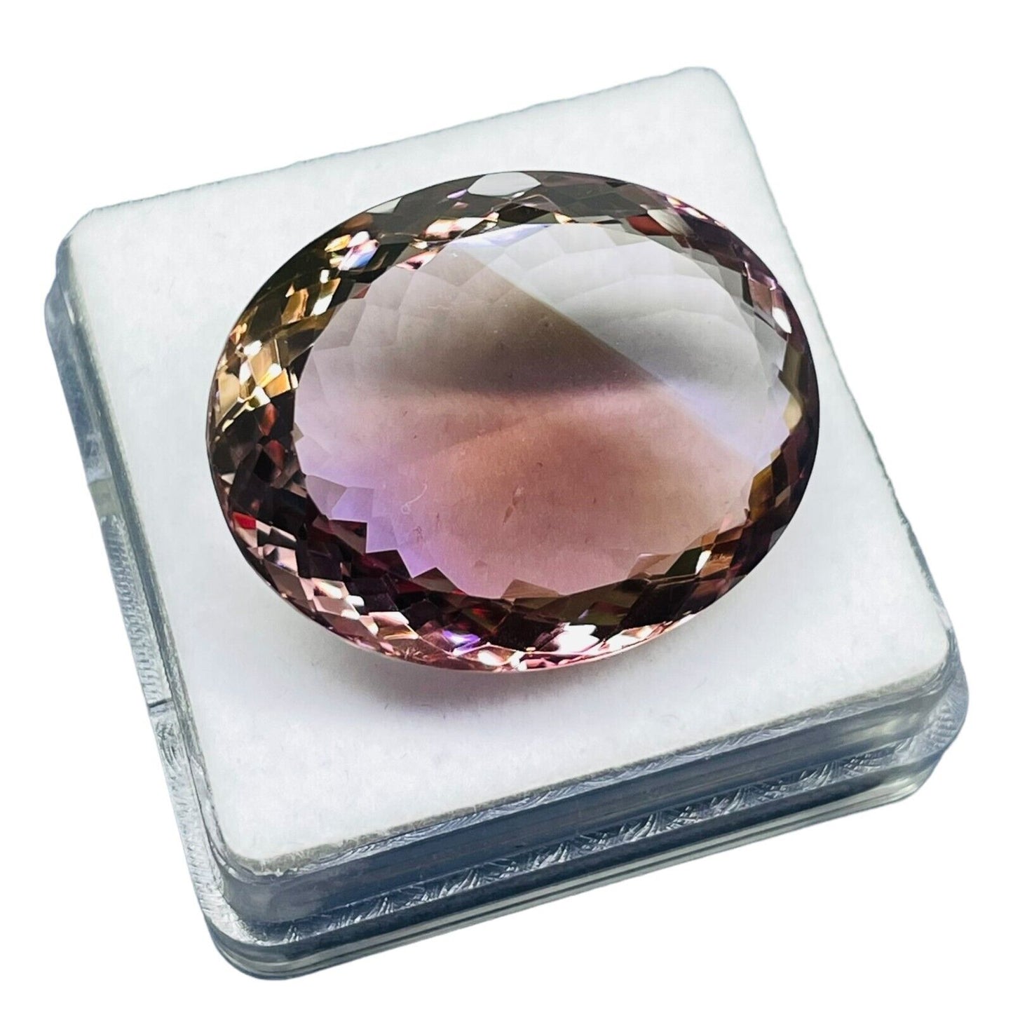 Ametrine ovale a facettes 31x25x12 mm 60.75 Carats Avec certificat